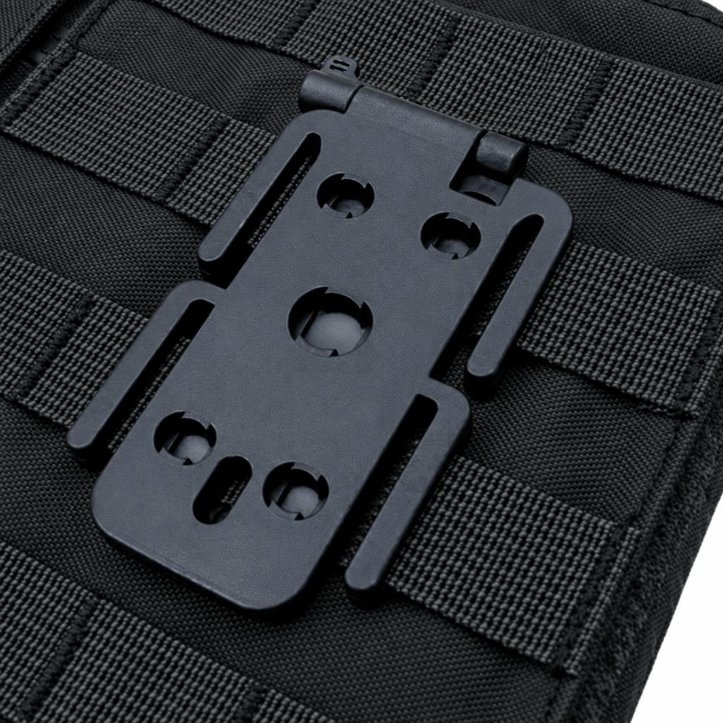 Close-up of a black plastic quick-release buckle mounted on a black tactical nylon pouch with webbing loops.